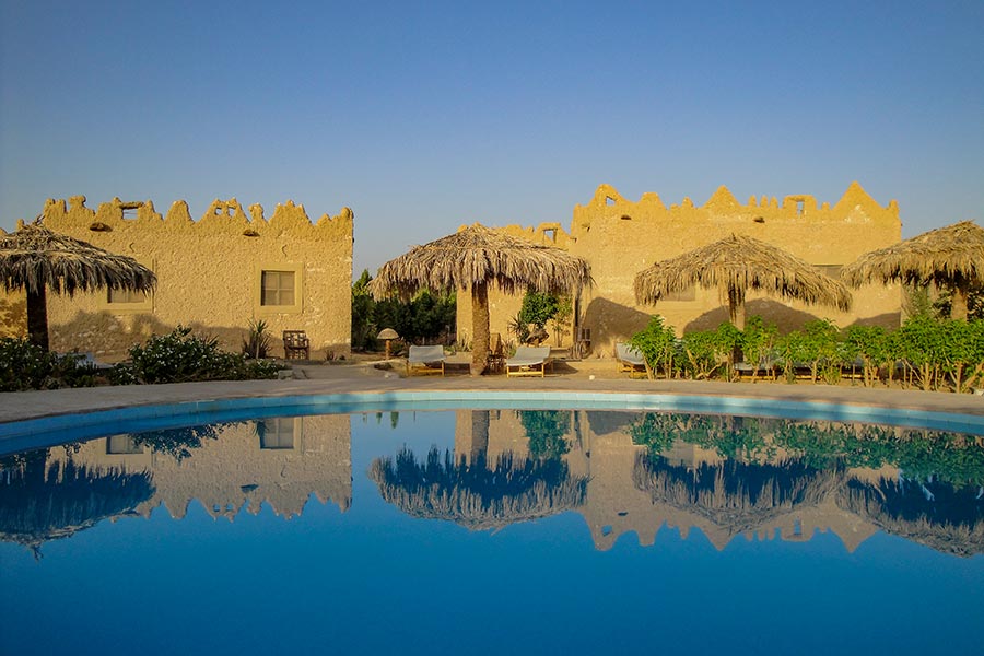 Abendstimmung am Pool im Hotel Siwa Shali